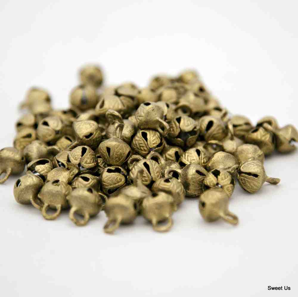 One Hundred 100 pcs Cross Cut Embossed Antique Brass Finish Bells